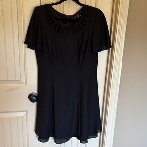 Chic Black Mini Dress with Elegant Detailing